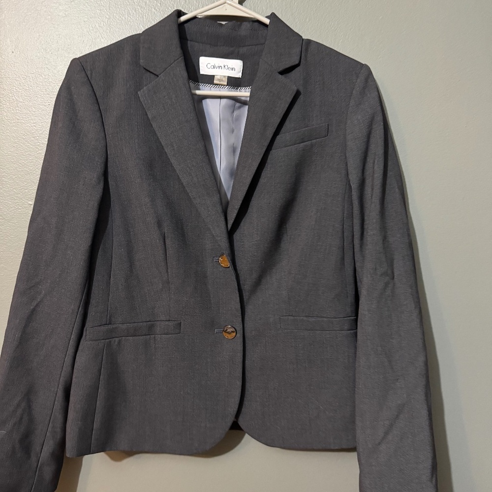Calvin Klein Suit set includes jacket, pants, and skirt